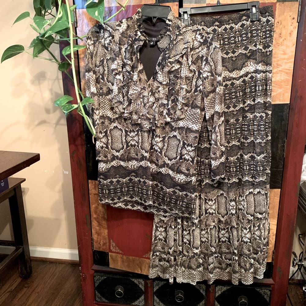 Coco Bianco snake print skirt set. Skirt size small. Top size Medium